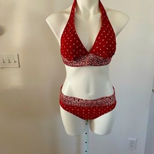 New without tags.  Never worn.  Red and white two piece bathing suit.